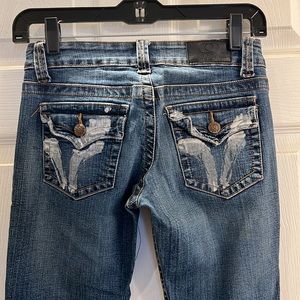 Denim Distressed Jean with Silver Detail on Back Pockets